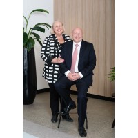 Jackie and Steve Bayly, Team Bayly - Ouwens Casserly Real Estate logo - Similar company to Strata Support - Outsourcing