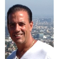 Tom Patania logo - Similar company to Graphicsflow