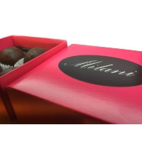 Milani Chokolade logo - Similar company to Milani Group Productions