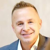 Roman Ziemian logo - Similar company to Tactic Bridge