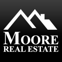 Moore Real Estate logo - Similar company to Vp Realty Group