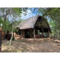 Vakantiehuis MHOFU bij het Kruger Nationaal Park, Zuid-Afrika logo - Similar company to Next Peak Media